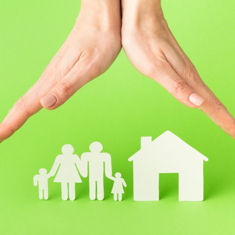 close-up-hanads-with-family-figure-concept