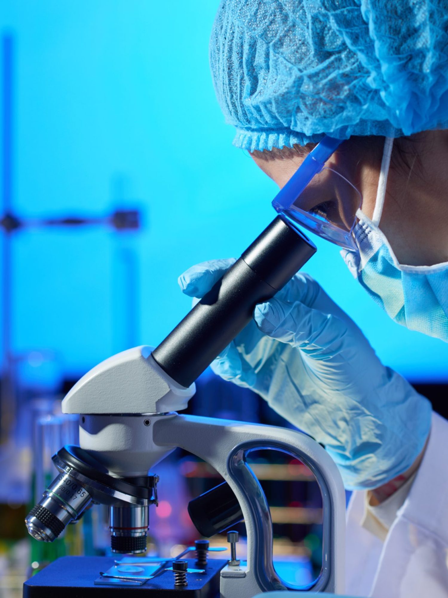 Examining Sample with Microscope