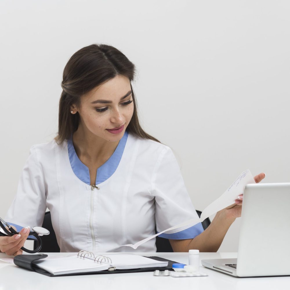 young-female-doctor-looking-n-medical-reports